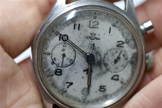 A gentlemans 1940s/1950s? stainless steel Lemania British military issue Royal Navy single button chronograph watch.